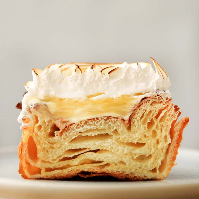 a caramelized pastry sliced in half